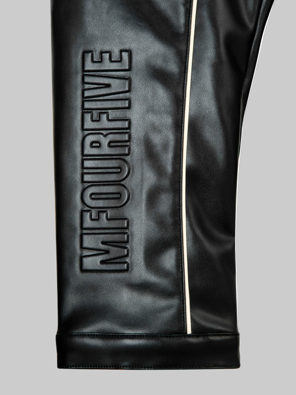 Detail shot of premium leather texture on M45 Black Leather Jacket - mfourfive luxury boxy fit streetwear