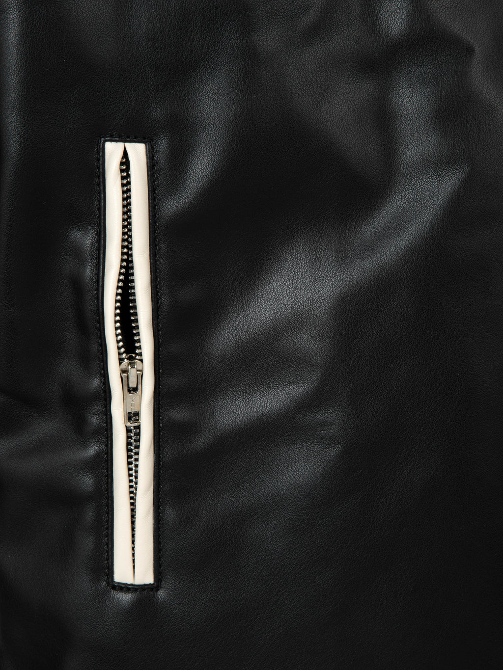 Detail shot of premium leather texture on M45 Black Leather Jacket - mfourfive luxury boxy fit streetwear