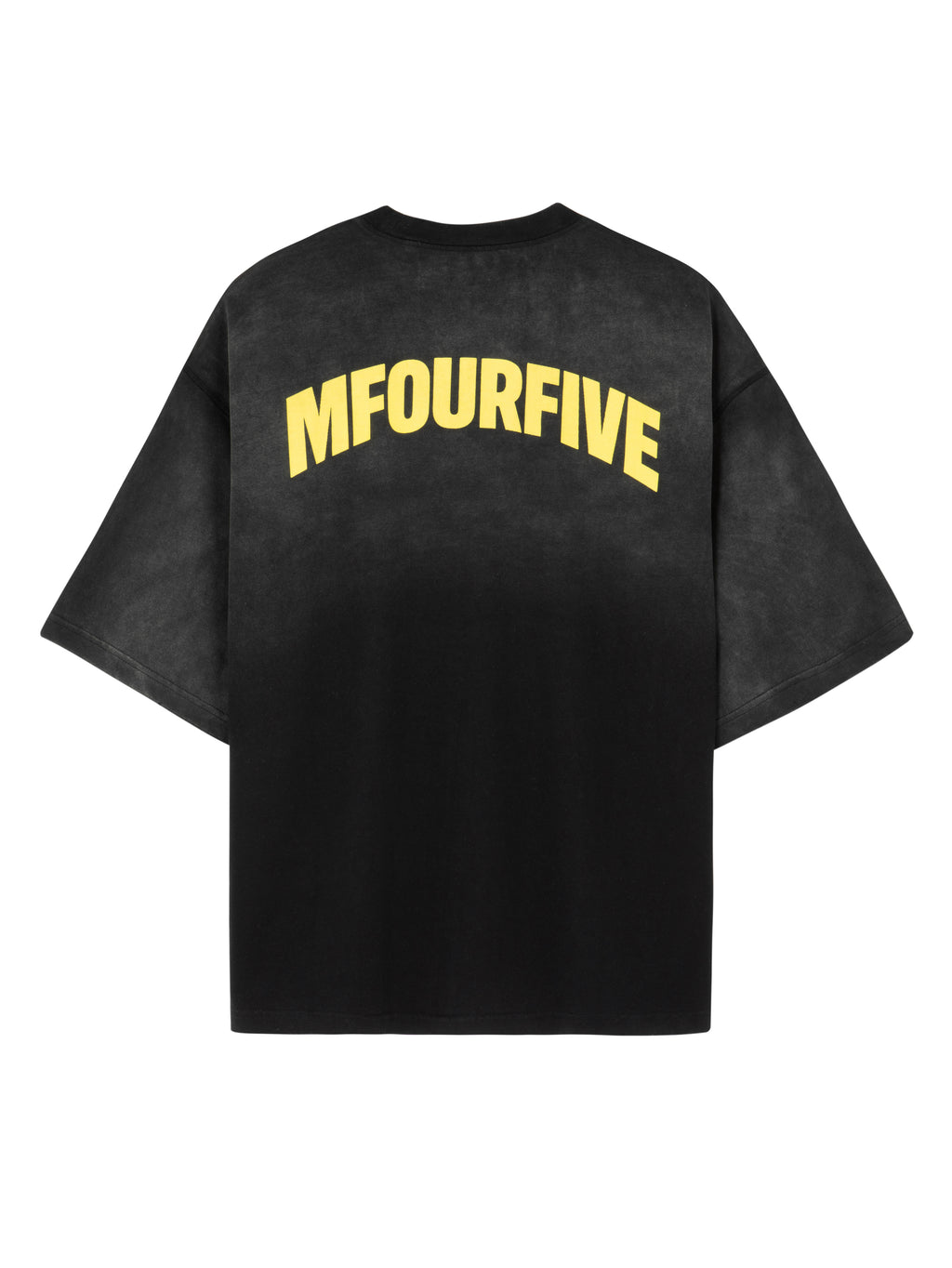 Back view of a vintage black Mfourfive oversized t-shirt featuring a large yellow arch logo across the upper back and subtle distressed details at the hem.