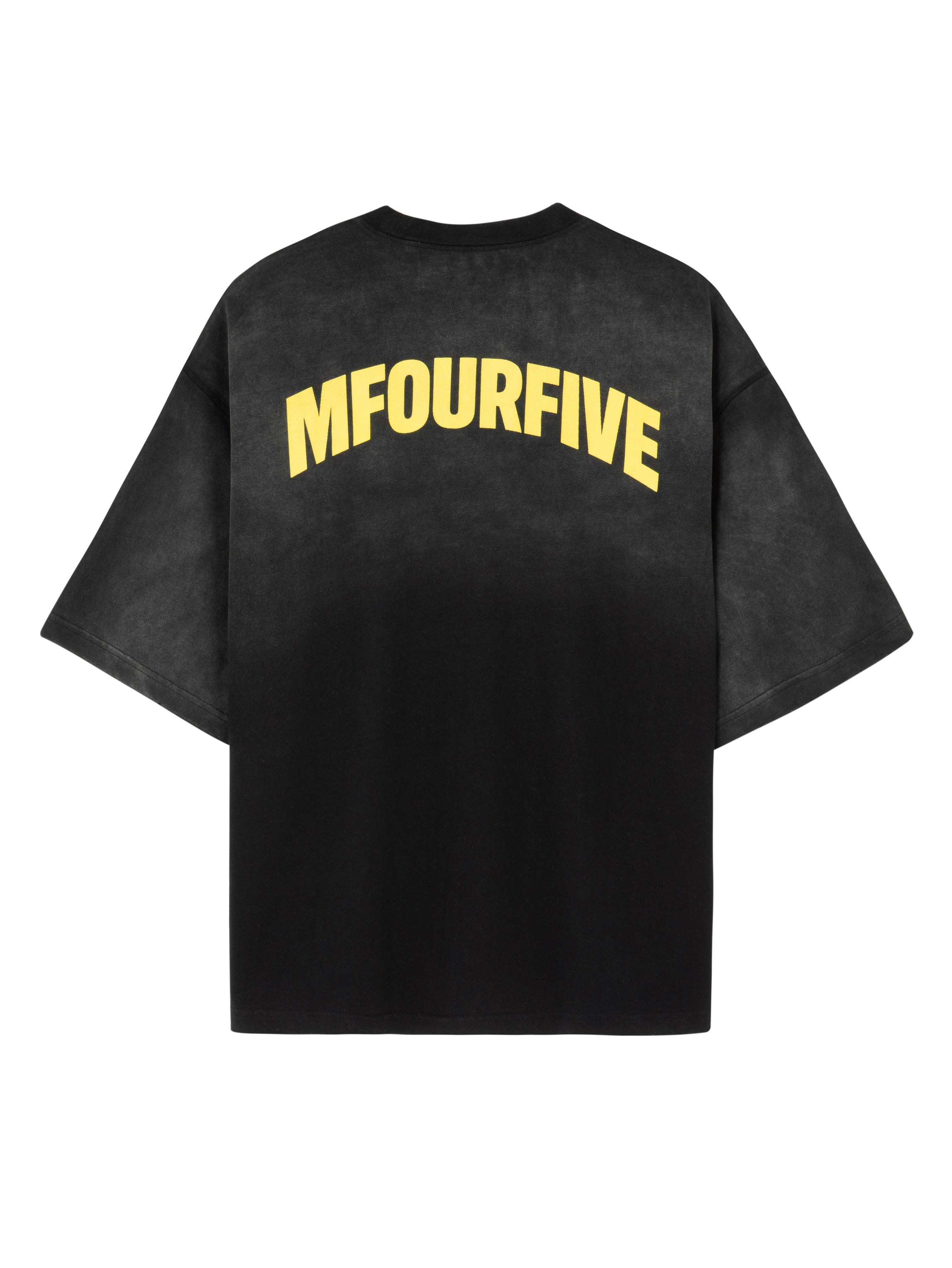 Back view of a vintage black Mfourfive oversized t-shirt featuring a large yellow arch logo across the upper back and subtle distressed details at the hem.