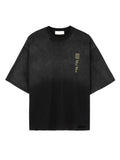 Front view of a vintage black Mfourfive oversized t-shirt featuring distressed details at the collar and hem, with a vertical yellow gothic MFF monogram on the left chest.