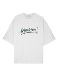 Front view of a white Mfourfive oversized t-shirt featuring a dark green graffiti-style script logo printed across the center chest.