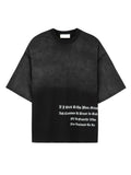 Front view of a washed black Mfourfive oversized t-shirt featuring a white gothic text print on the lower side that reads "If I Stick To The Plan, Grind And Continue To Trust In God I'll Be Exactly Who I'm Destined To Be".