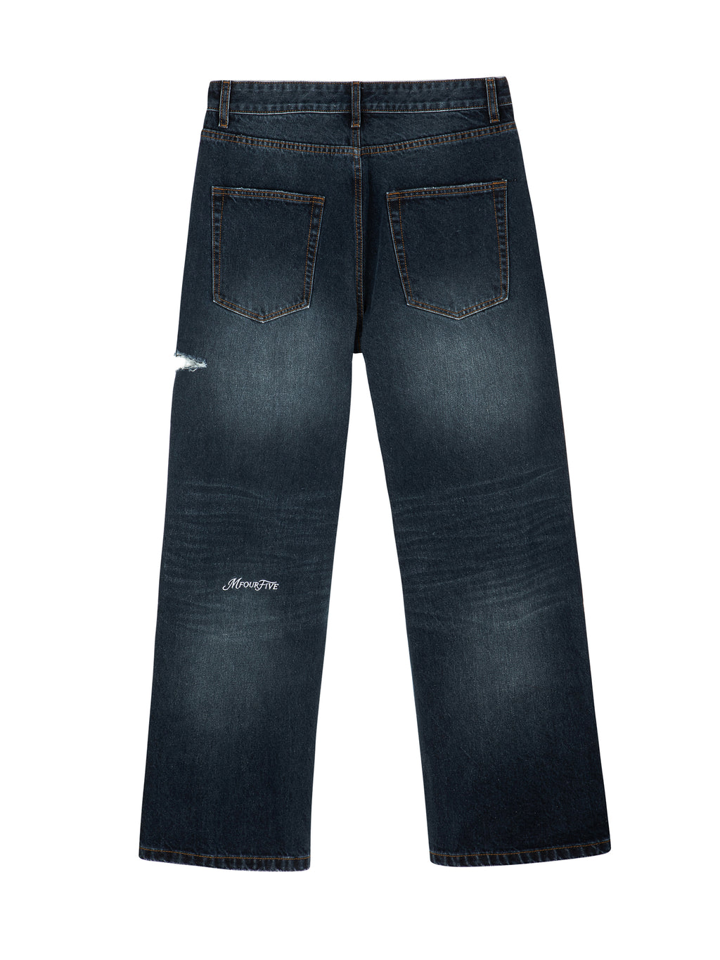 Back view of dark indigo wash Mfourfive relaxed jeans displaying vintage fading and a white embroidered logo on the lower left leg.