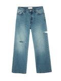 Front view of light wash Mfourfive relaxed straight-leg jeans with a distressed knee and a unique side slit on the left outer thigh.